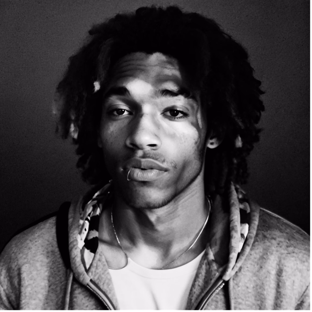 Houston - A handsome 22-year-old with vitiligo and a protective streak, navigating his demons while braiding h